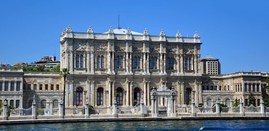 An historical Dolmabahçe Palace and water in the front. 