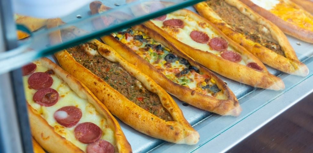 Assorted Turkish food set. Pide with meat; pide with cheese , pide mix, lachmajun