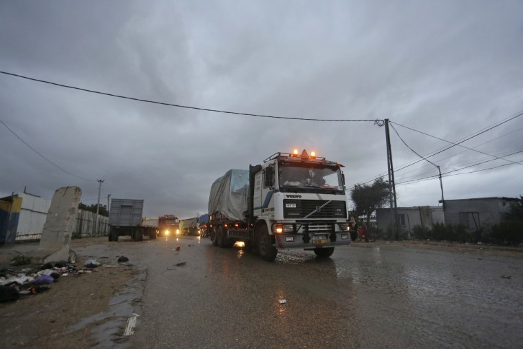 Humanitarian aid trucks arrive in Rafah, Gaza Strip, on Monday, Nov. 27, 2023. 