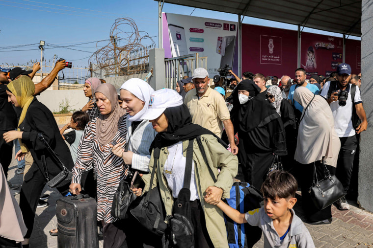 Scores of foreign passport holders trapped in Gaza started leaving the war-torn Palestinian territory on November 1 when the Rafah crossing to Egypt was opened up.
