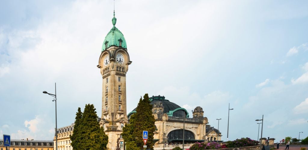 LIMOGES, FRANCE - May 8, 2018: Main railway station of Limoges in Limoges, France'nCathedral in Limoges, France