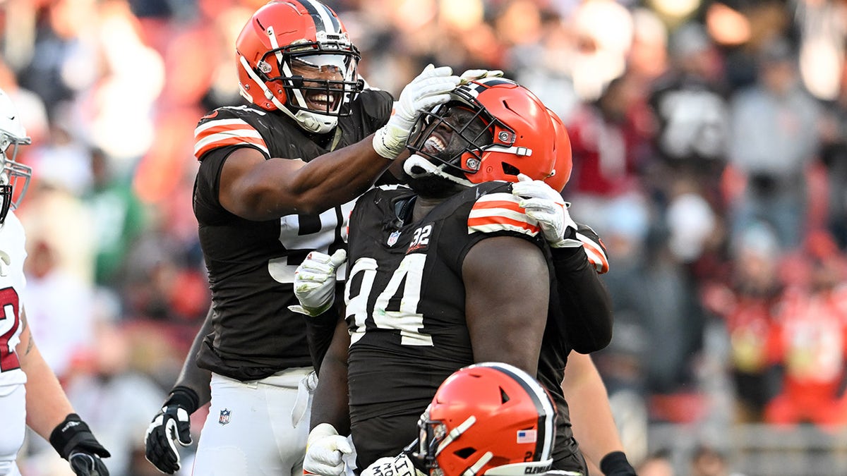 Browns defenders celebrate