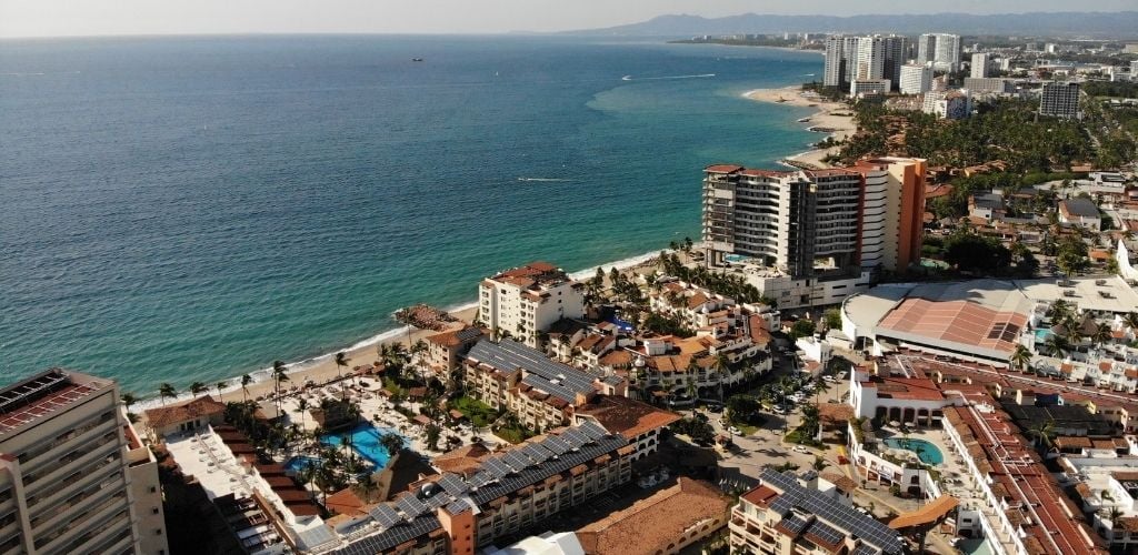 Aerial view of buildings and sea view. 