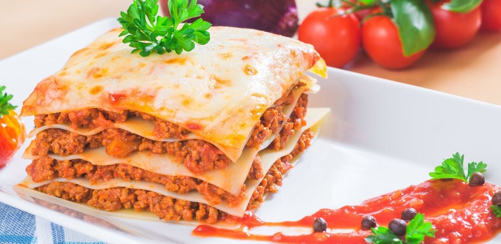 Lasagne meal made from pasta and minced meat with tomato sauce. 