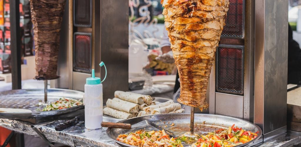 Traditional Turkish food chicken doner and beef doner kebab on street
