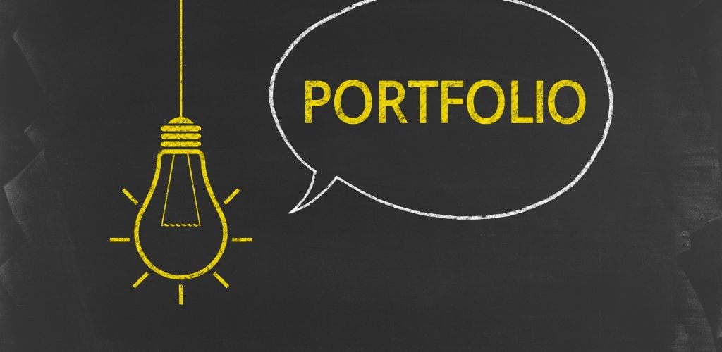 Portfolio - Business Chalkboard Background with light bulb 