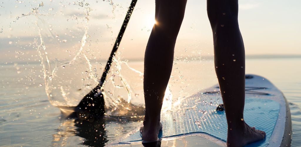 paddle boarding nighttime 