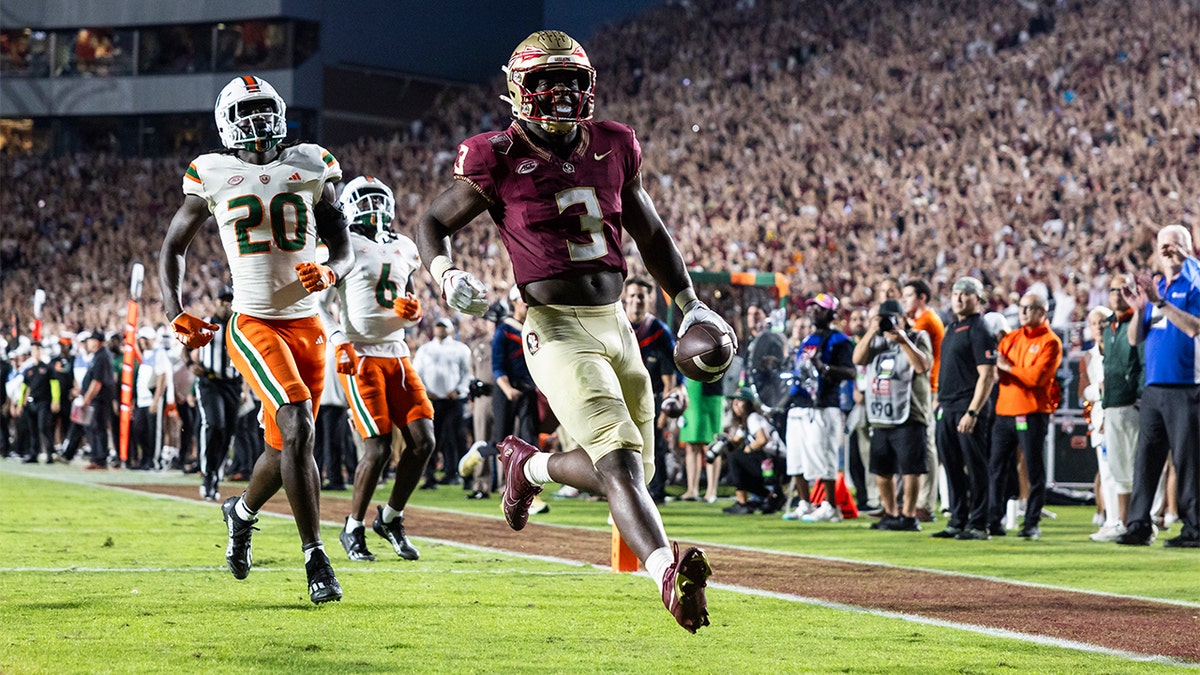 Trey Benson scores a touchdown