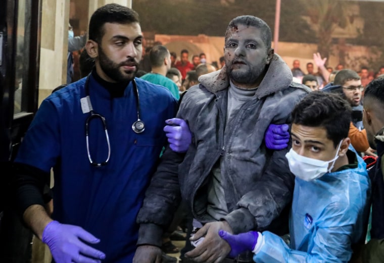 Injured Palestinians arrive at Nasser Medical Hospital on Dec. 4, 2023 in Khan Younis, Gaza. 