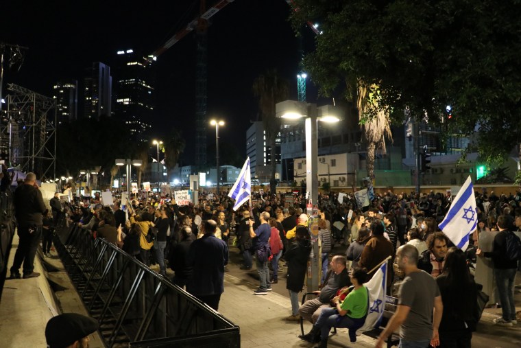 Hundreds of people gathered for the protest outside Israel's Defense Ministry in Tel Aviv.