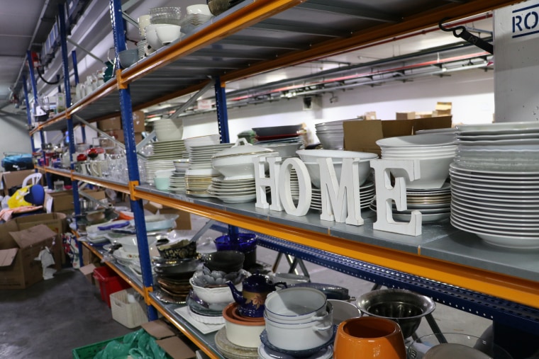 Kitchenware sits in the donation 'store,' where Israeli families affected by the war can visit to pick up any items they need.