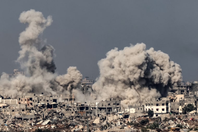 Smoke rises during an Israeli strike in northern Gaza on Dec. 8, 2023.