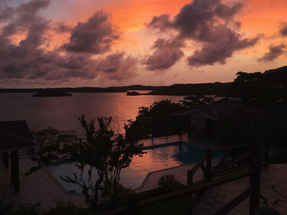 house sitting in grenada sunset over the sea