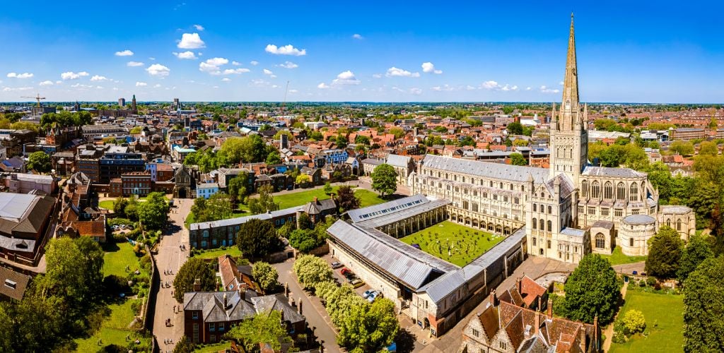 Aerial image of Norwich Cathedral in Norwich, Norfolk, and the houses and buildings that surround it. 