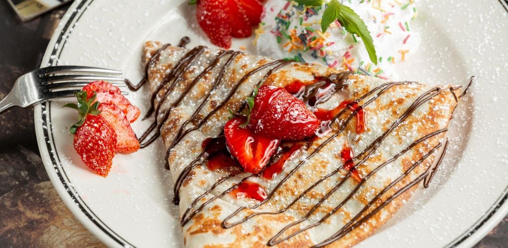 Sweet Crepe with Strawberries and Cream