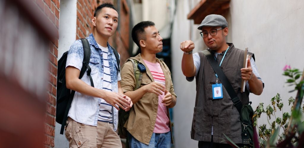 Local guide and two men guide the scenery