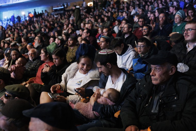 Many families were in the crowd at the conference Sunday. 