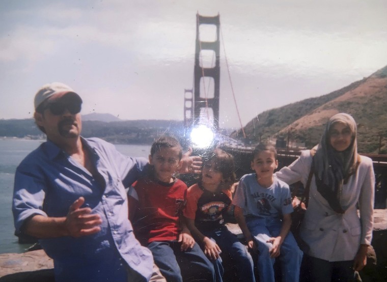 Abedalla Sckak, left, with his wife Zahra Sckak and children.