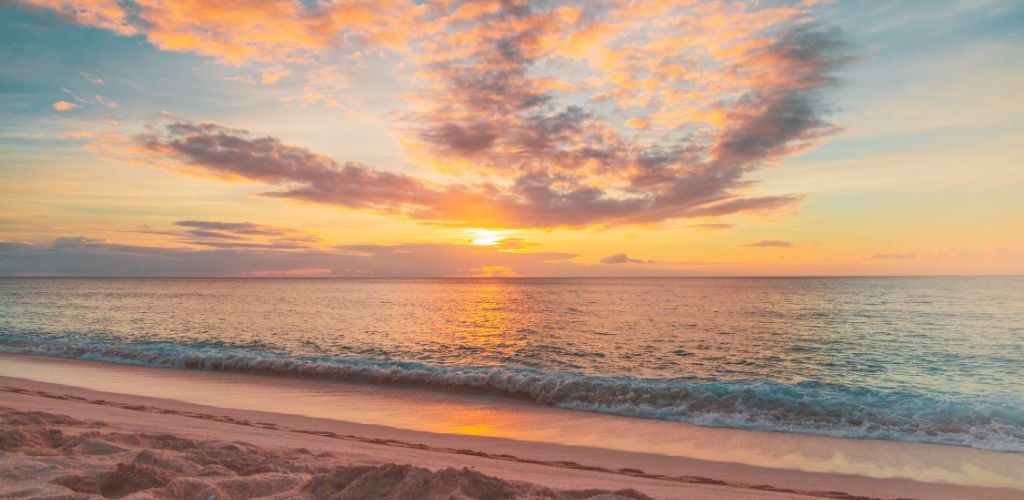 Sea Waves Crashing on Shore during Sunset