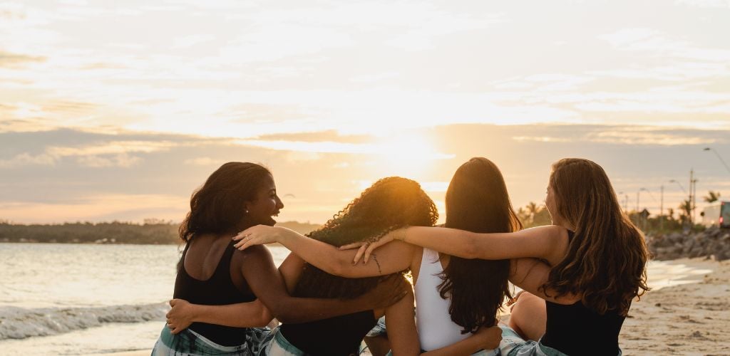 group of friends on beach 