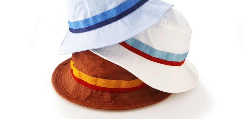 A blue,vwhite and brown breathable sun hat.