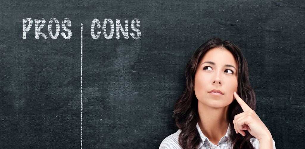 A woman making a decision and a chalk board on her background written a Pros and Cons.