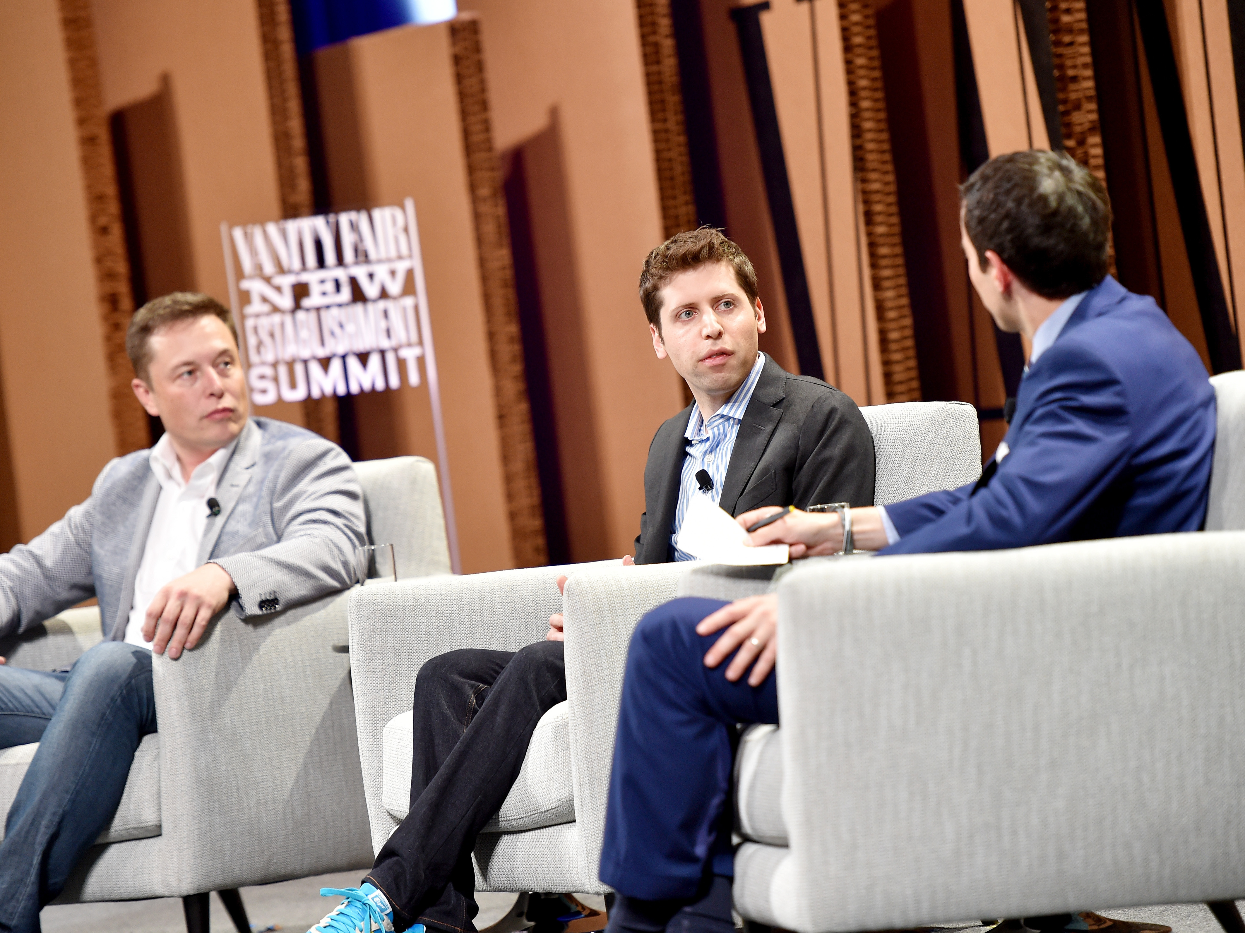 From left, Elon Musk, Sam Altman and Andrew Ross Sorkin, <em>New York Times</em> financial columnist, speak during the Vanity Fair New Establishment Summit at Yerba Buena Center for the Arts on Oct. 6, 2015, in San Francisco.’/></p>
<p>A former co-chair of OpenAI, Musk says he invested millions in the AI lab on “false promises” that it would be nonprofit and open-source. OpenAI is now backed by Microsoft.</p>
<p>(Image credit: Mike Windle)</p>
<p><img src=