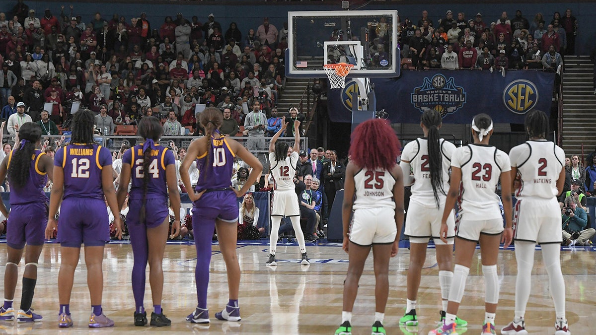 Players shoots a free throw