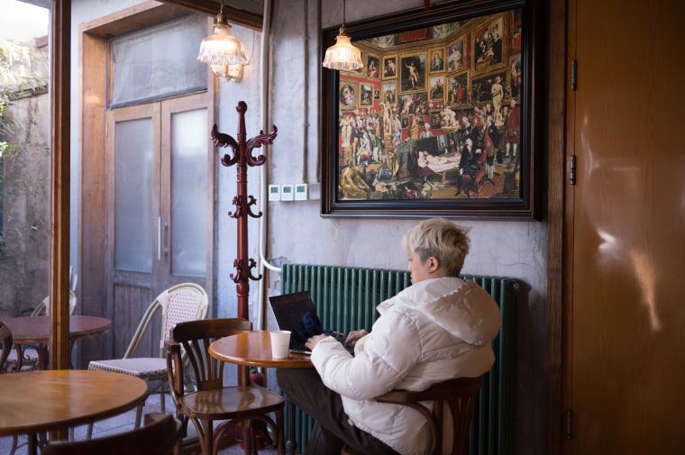 A patron works on a laptop at Metal Hands coffee shop in Beijing.