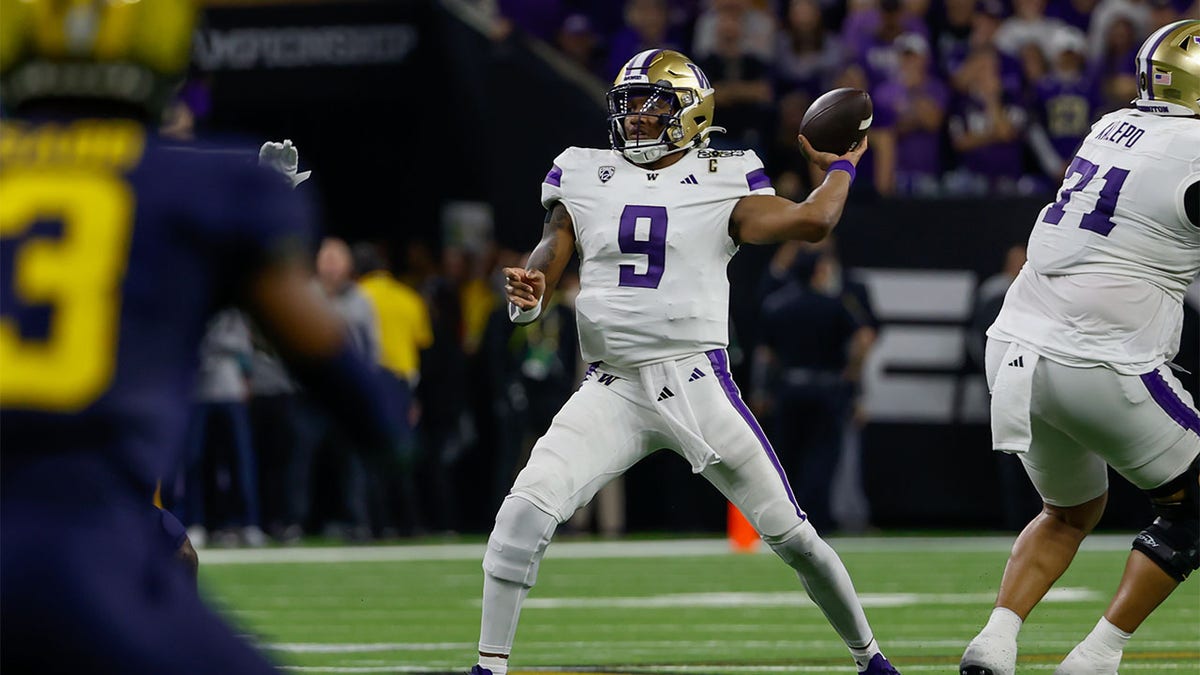 Michael Penix Jr. attempts a pass