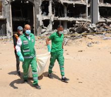 In the wake of IDF retreat, Gazans sift through the rubble for the bodies of their dead