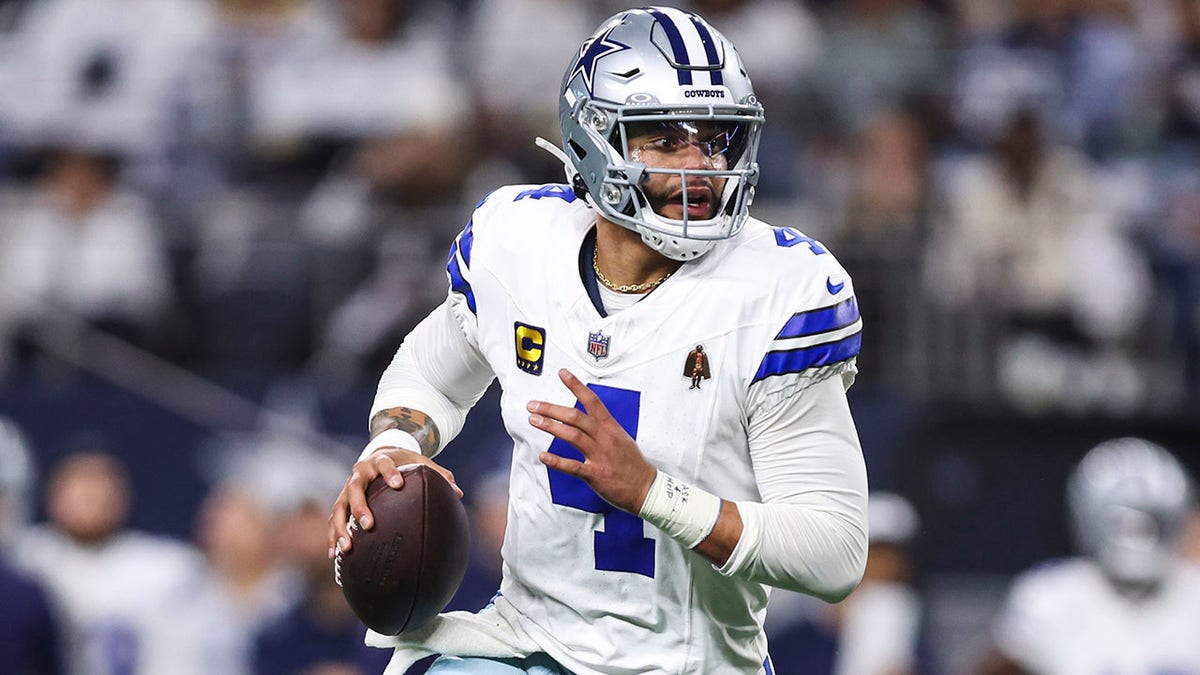 Dak Prescott looks to pass