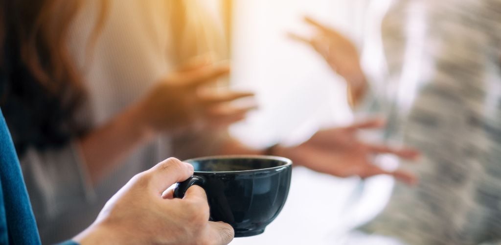 tea and coffee facilities, people talking over coffee