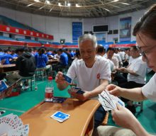 In China, poker is out, while ‘throwing eggs’ is in