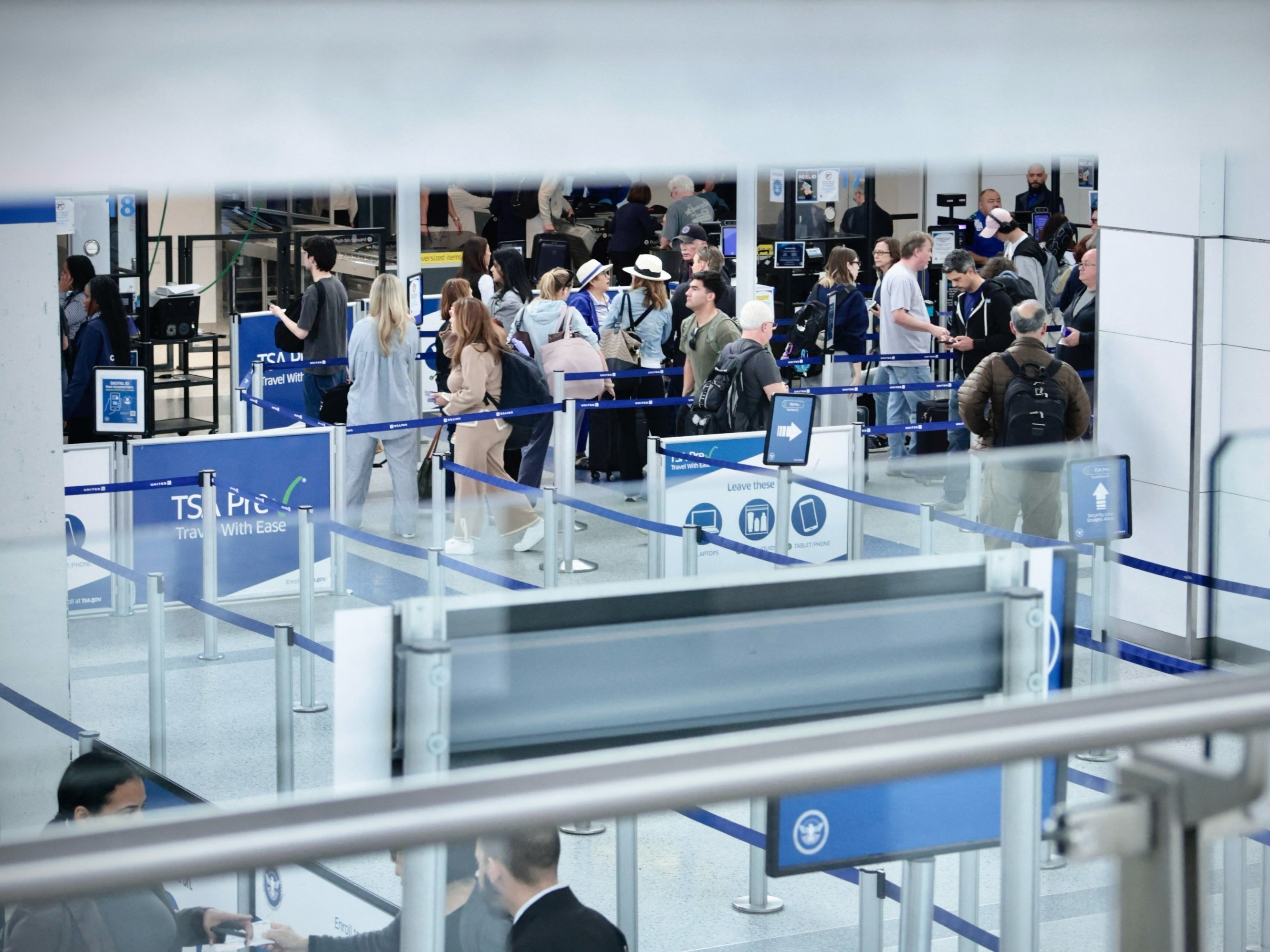 Passengers arrive at Newark Liberty International Airport in Newark, New Jersey on May 7, 2025.