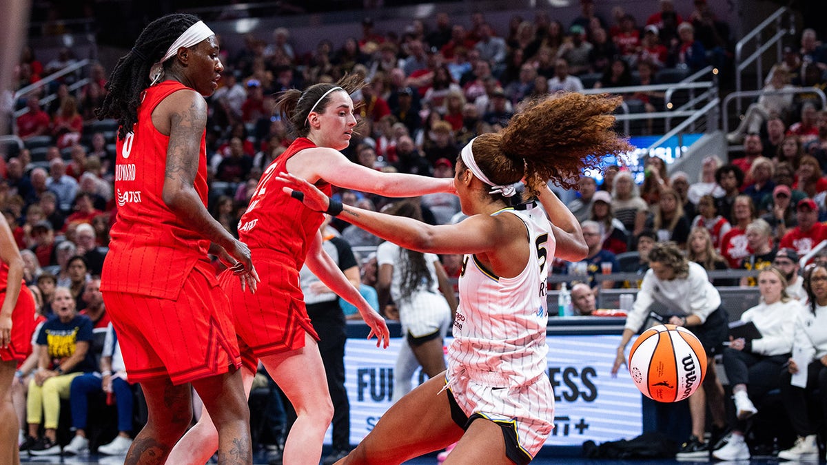 Caitlin Clark fouls Angel Reese