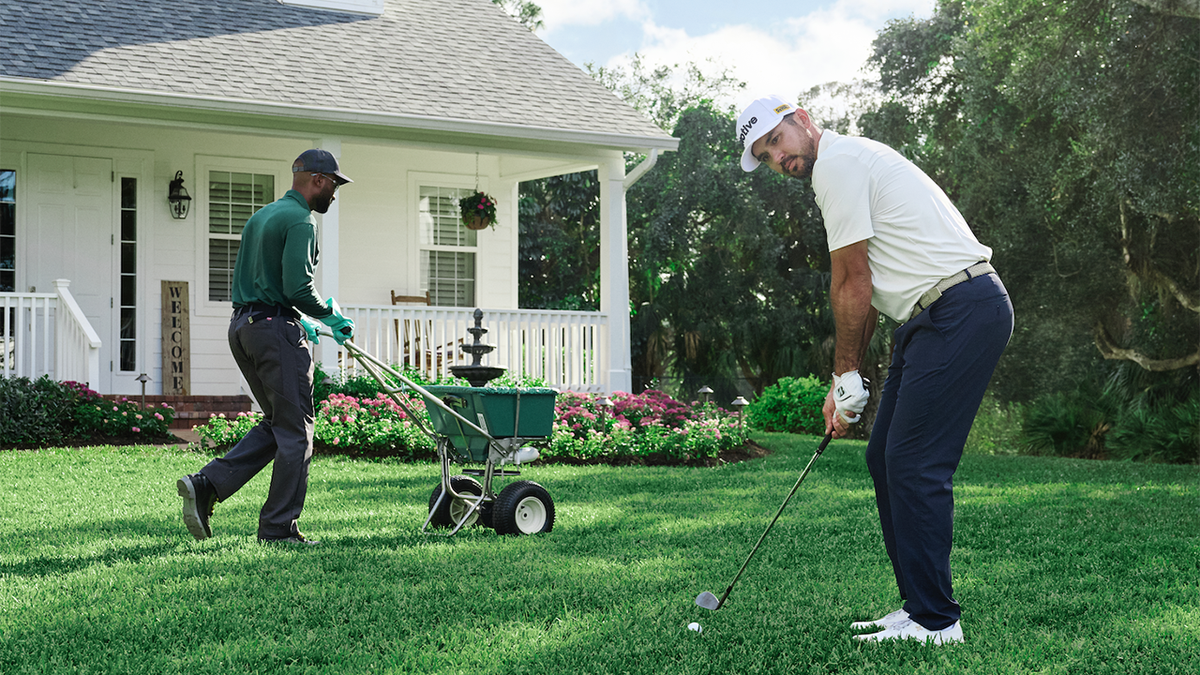 Jason Day on lawn