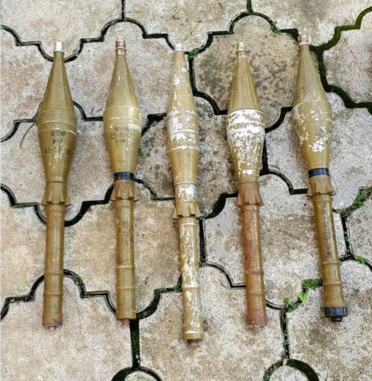 Artillery shells on the ground.