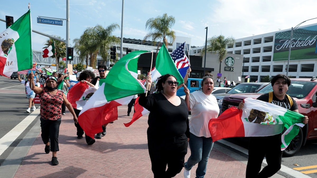Protesters in front of the Intuit Dome before the Concacaf Gold Cup Mexico versus Dominican Republic in Inglewood on Saturday, June 14, 2025.