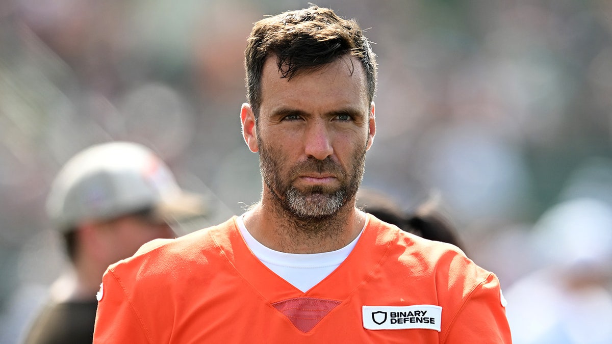 Joe Flacco looks on