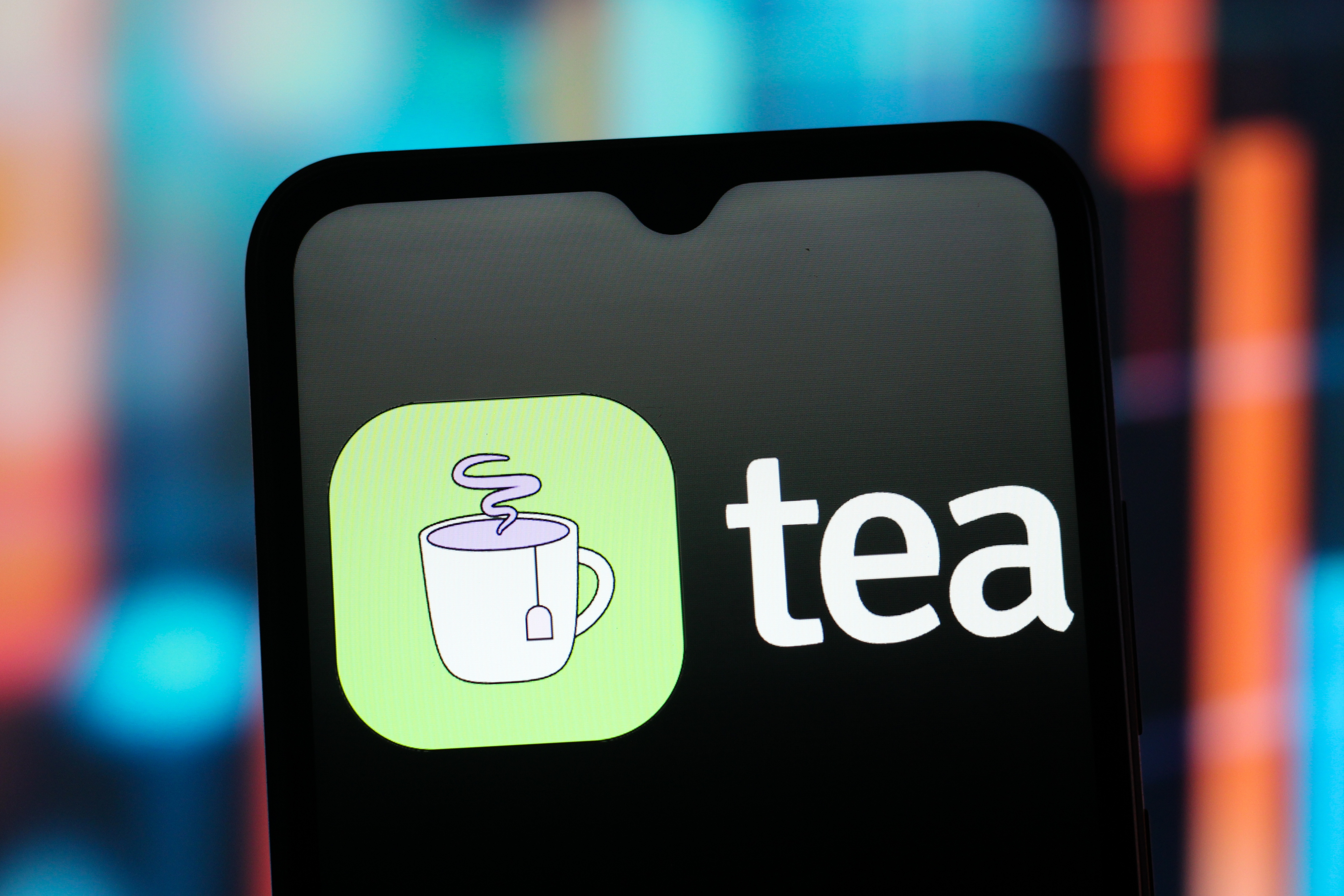 In this photo illustration, the Tea app logo is seen displayed on a smartphone screen. The dating advice app suffered a major data leak last month.