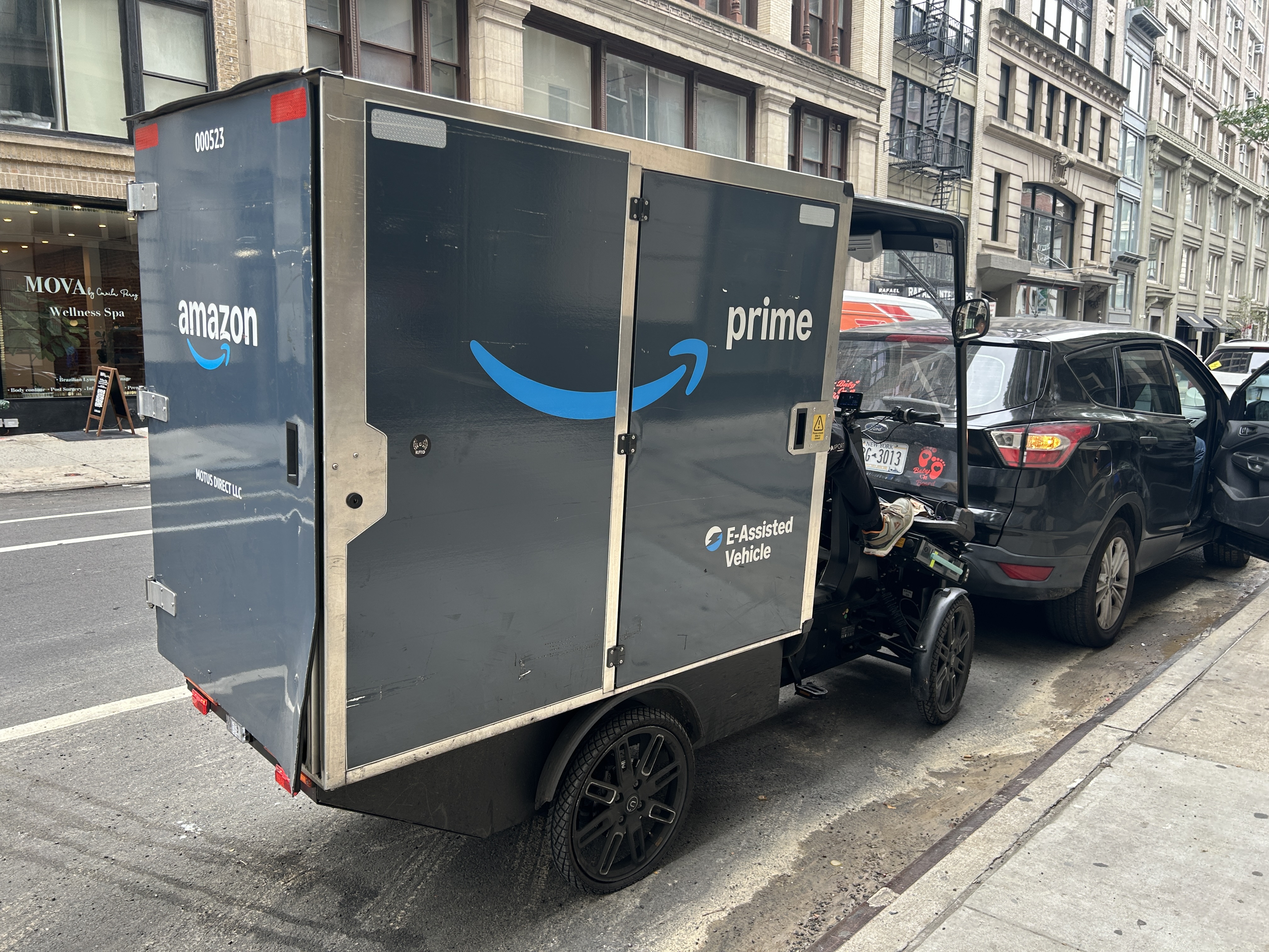 Amazon Prime pedicab delivery person on New York City Streets, Manhattan.