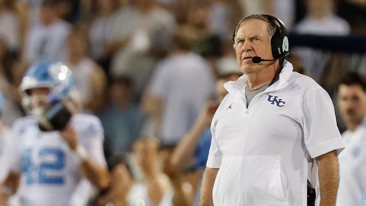 Bill Belichick looks on