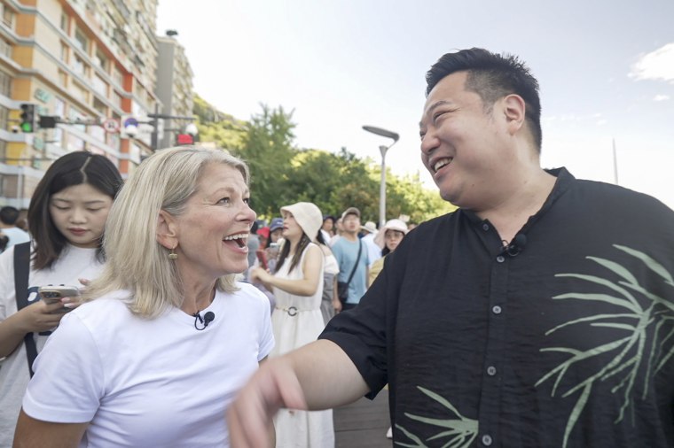 Ryan Chen with NBC News’s Janis Mackey Frayer in Chongqing, China, last month.
