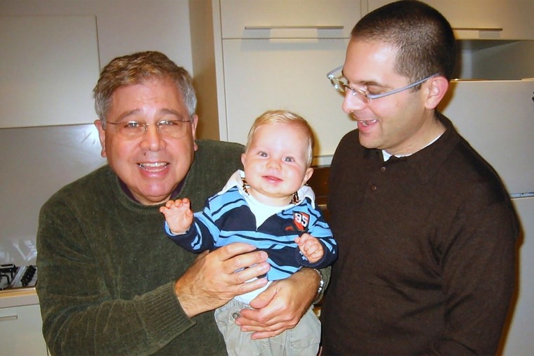 Richard Lakin, his grandchild and his son, Micah Avni.