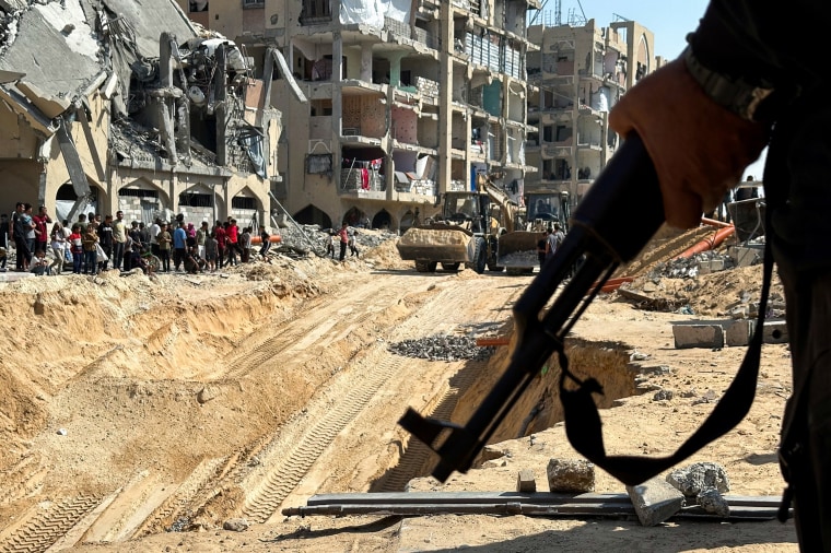 Search for the bodies of hostages killed after being seized by Hamas, in Khan Younis