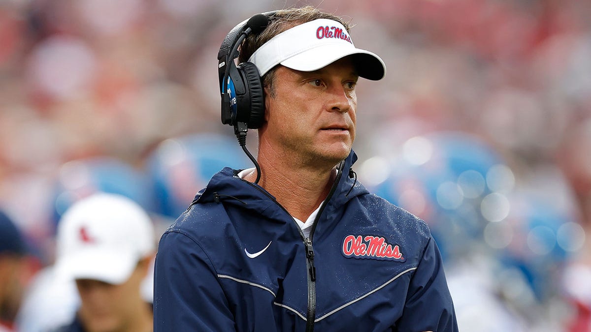 Lane Kiffin looks on during a game