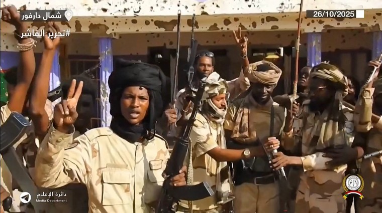Fighters with Sudan's paramilitary Rapid Support Forces celebrate in the streets of El-Fasher in Sudan's Darfur region in an image released on the RSF Telegram account on October. 26, 2025.