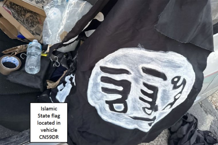 Two home-made, painted IS flags were seized by police.