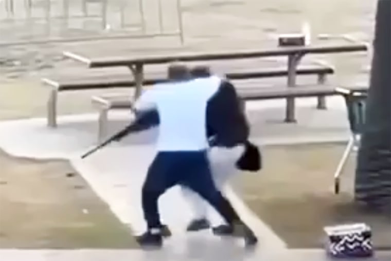 A member of the public disarmed one of the attackers in a dramatic scene captured Sunday.
